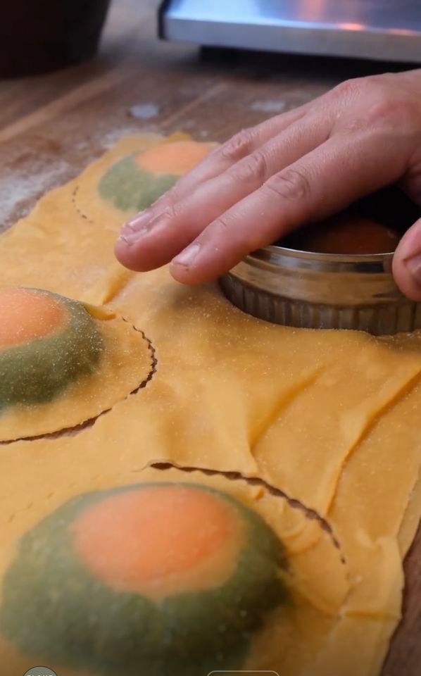 Spinach and egg yolk stuffed giant ravioli 