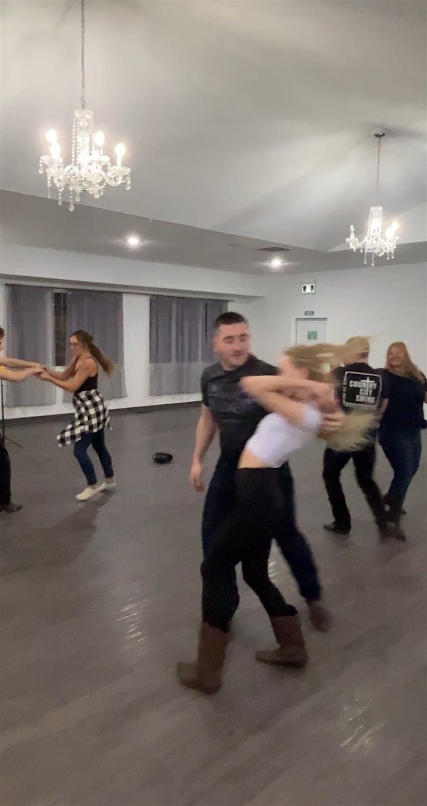 Young adults country swing dance social