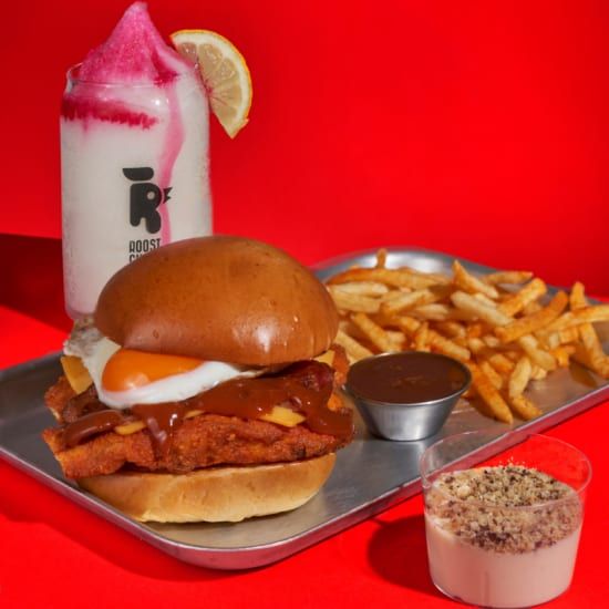 Men\u00fa Roost Chicken ( Bail\u00e9n ) - Hamburguesa con patatas + bebidas y postre o caf\u00e9