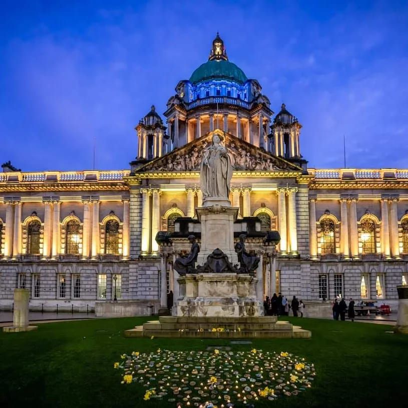 Belfast City Hall illuminates Yellow to remember all those lost during the pandemic.