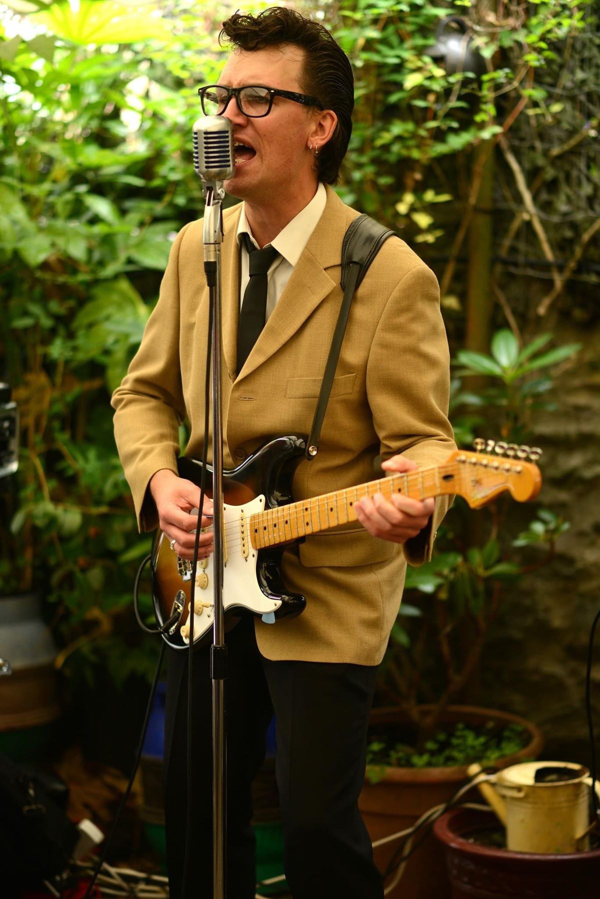 Jimmy Lee as Buddy Holly