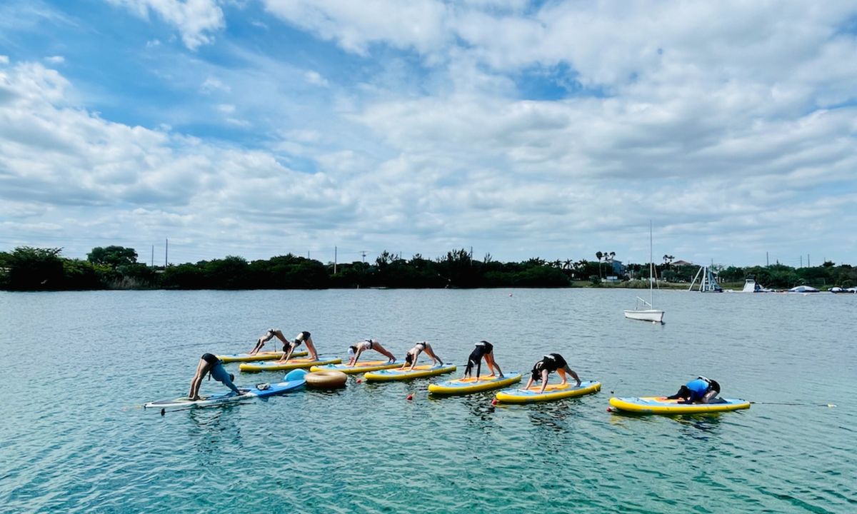 Turquoise Floating Yoga: Paddle & Flow SUP Yoga Class at TigerTail Lake