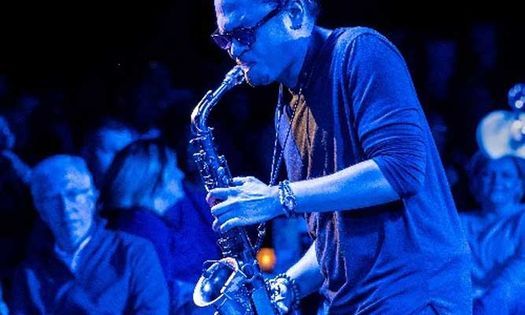 Saxophonist Adrian Crutchfield plays Kenny G
