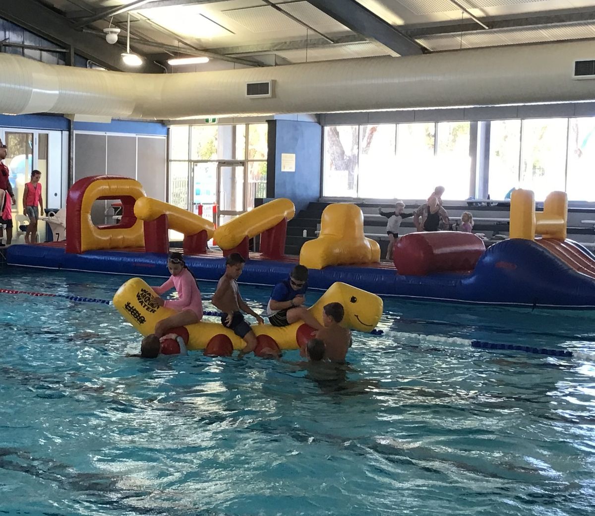 Giant Indoor Pool Inflatable: Slide into Fun!