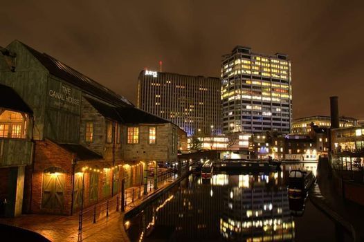 Photograph Birmingham's canals by night.