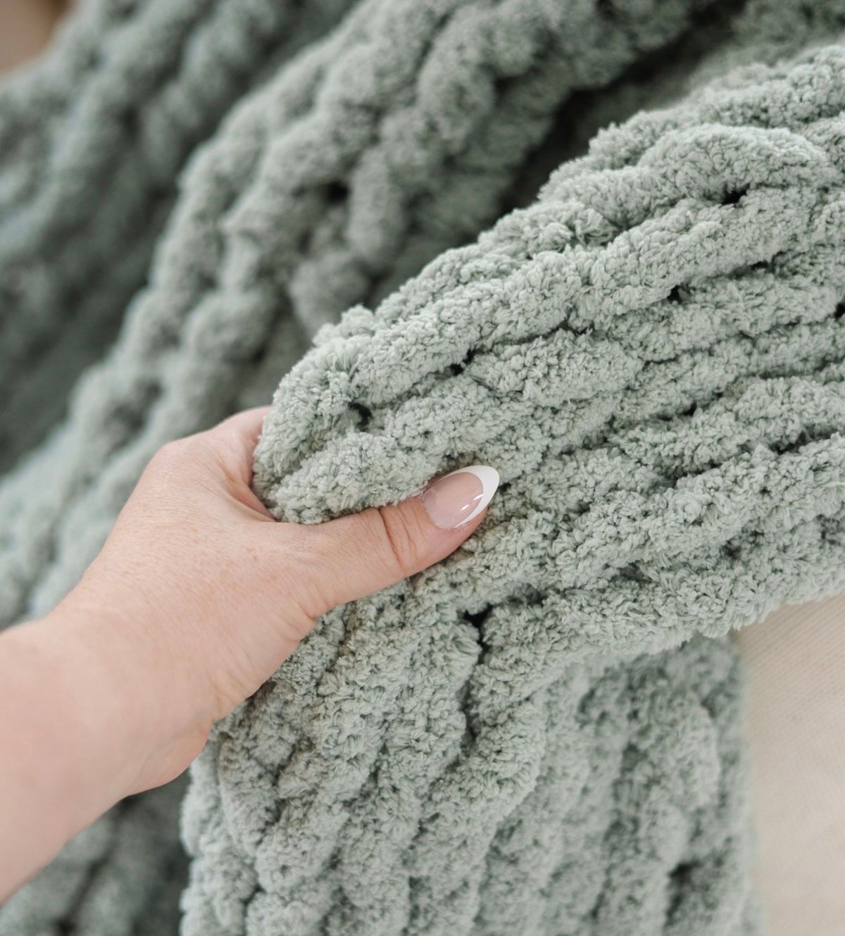 Chunky hand knit blanket at Wandering Roots 