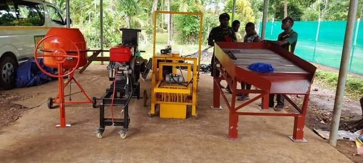 PNG locally made egg layer mobile brick machines, manual mould brick Makers and sand Screenmachines 