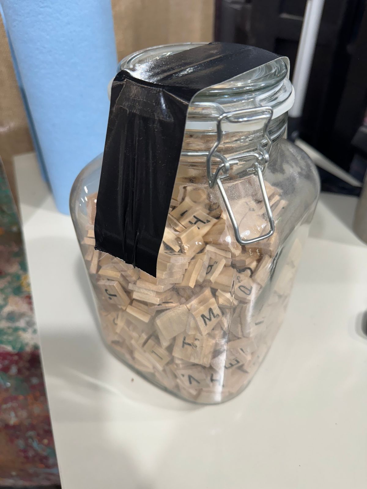 Guess the number of scrabble pieces in this jar.  