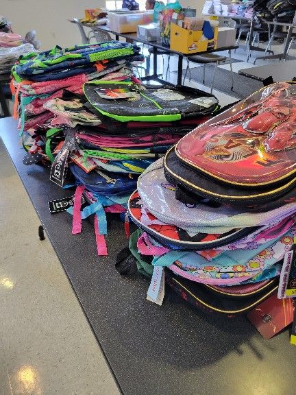 Backpack Program for Larimer County K-12 Children, children must be present.