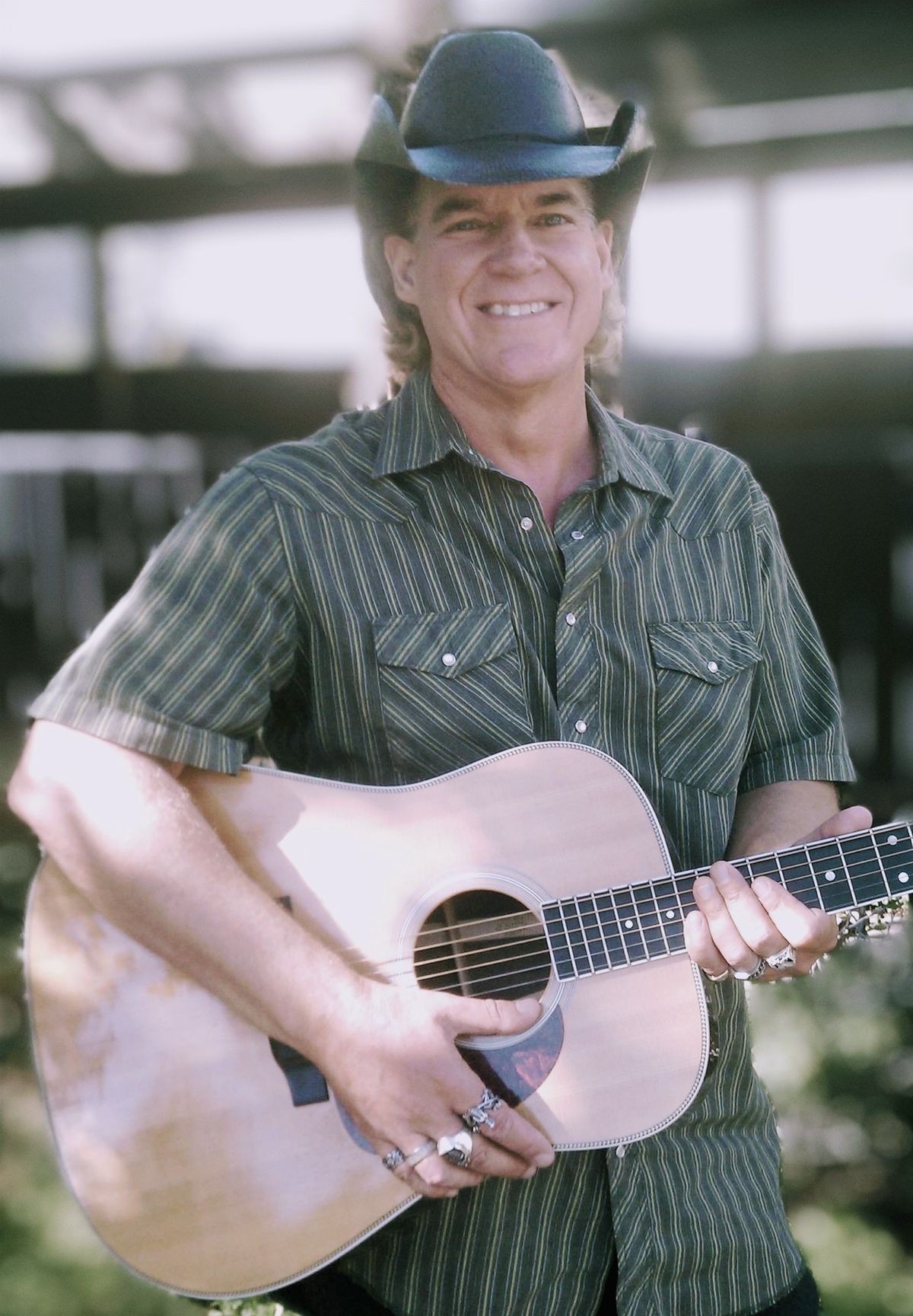 Dave Ouzo Land does the San Mateo Farmers Market