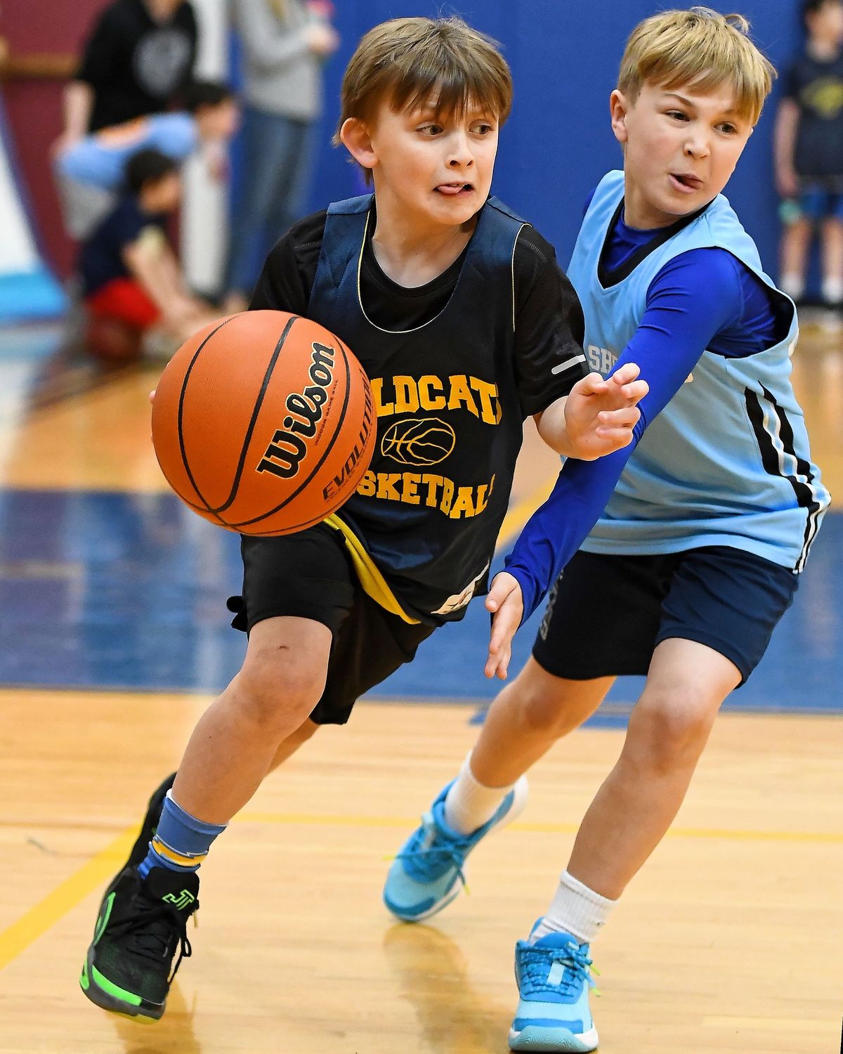 Buckets for St. Baldrick's charity basketball tournament