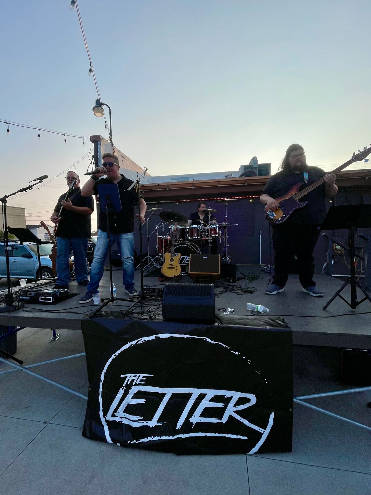 The Letter Rocks Out 702 Bar