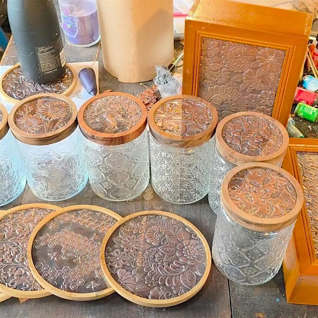 Copper embossed cocoa jars at The Vineyard at Hershey