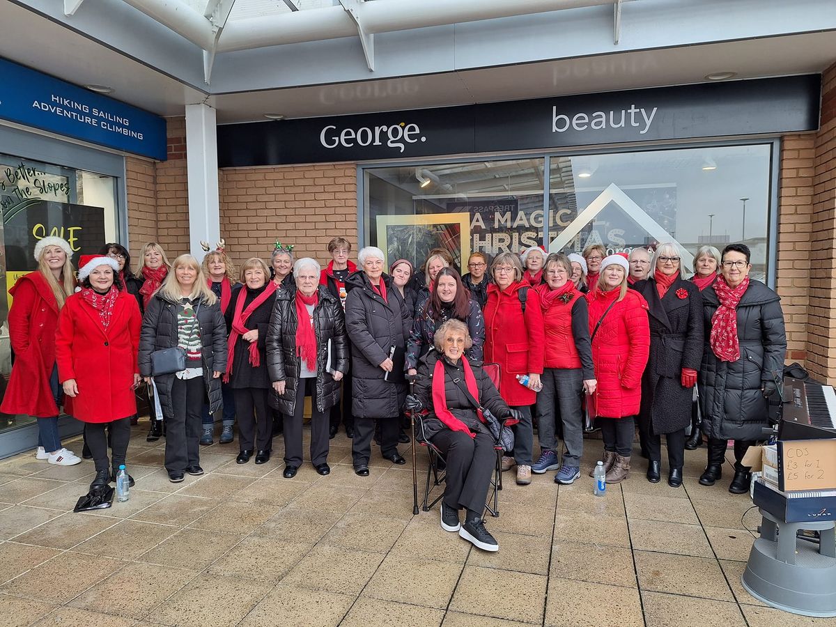 C\u00f4r Curiad Christmas Carols at Trostre Retail Park.