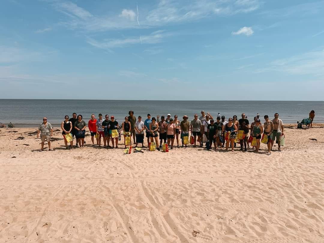 UVA Club of Tidewater Cavs Cares Beach Cleanup with Bold Mariner 