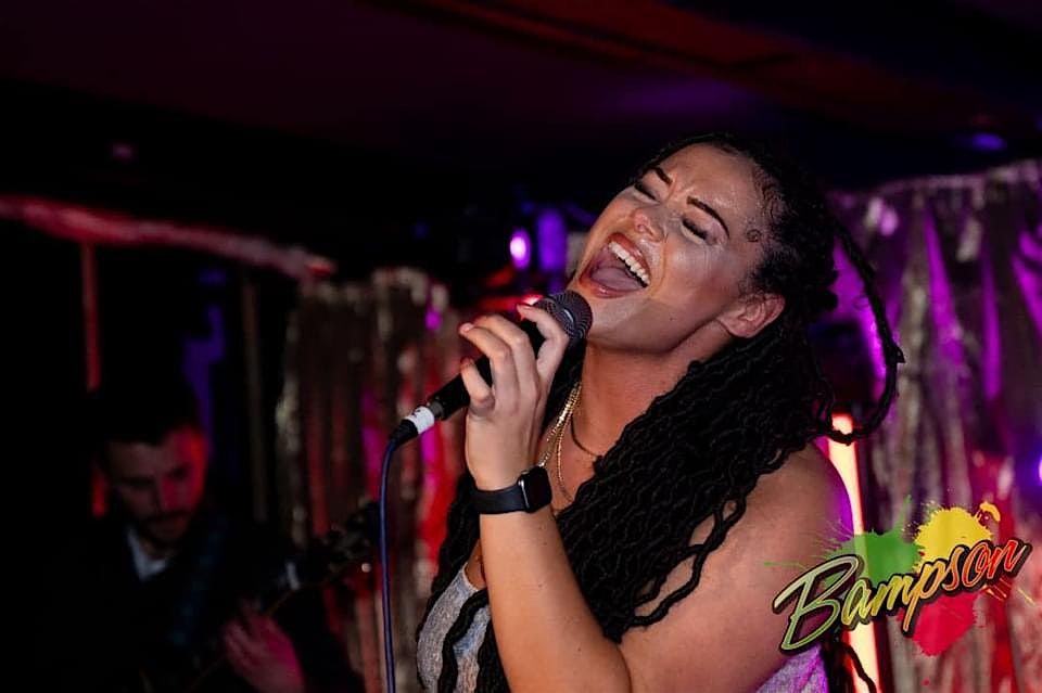 Carib Vibes Bar & Jerk Grill Presents Aleighcia Scott