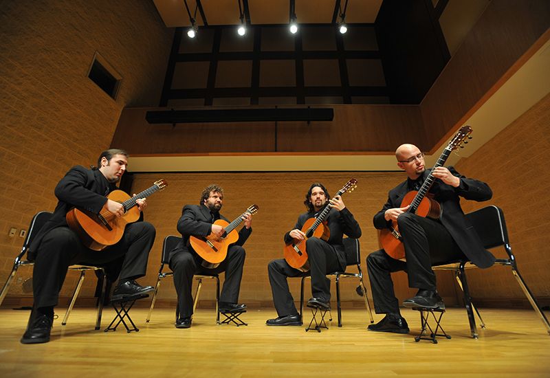 Guitar Reflections: Ensemble Mastery and Solo Performances