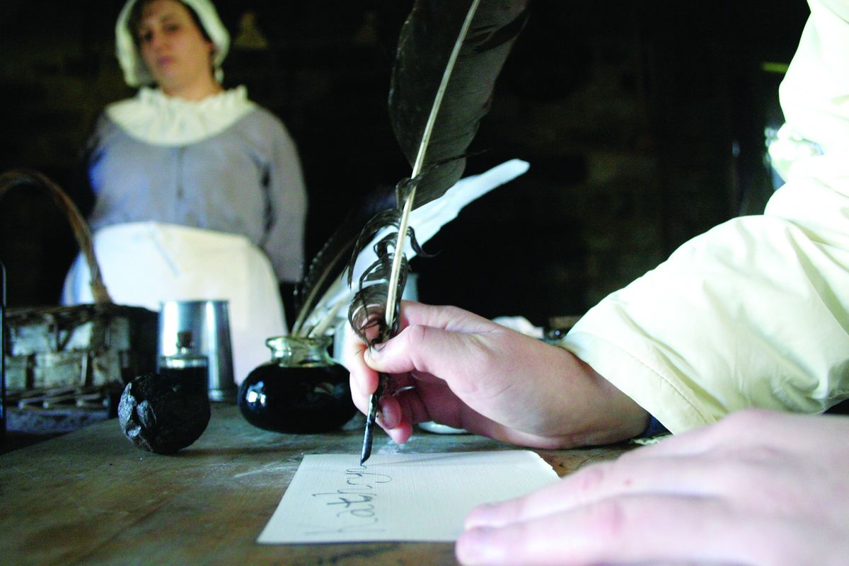 Quill Pen Writing in the Historical Park 