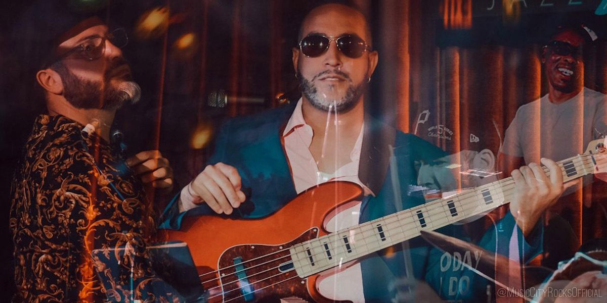 Giovanni Rodriguez and 12 Manos