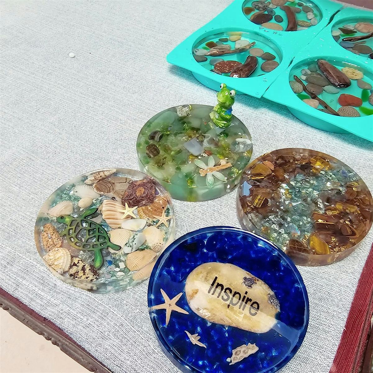 Resin coasters made with crystals and natural elements