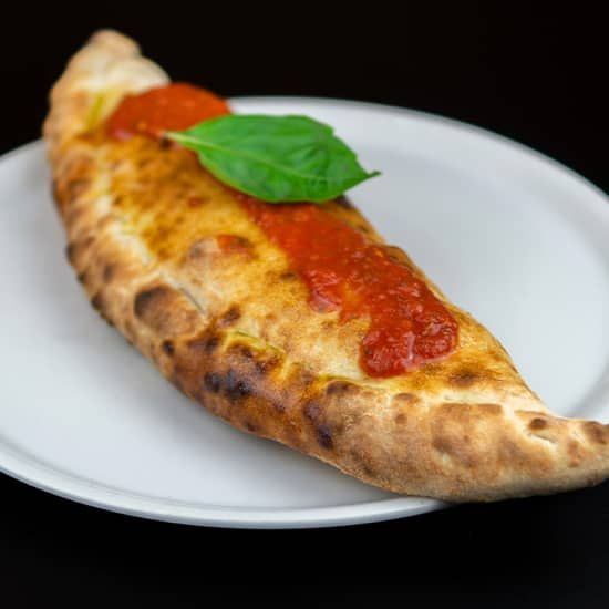 Men\u00fa de pizza o burger en Pizzi & Dixie