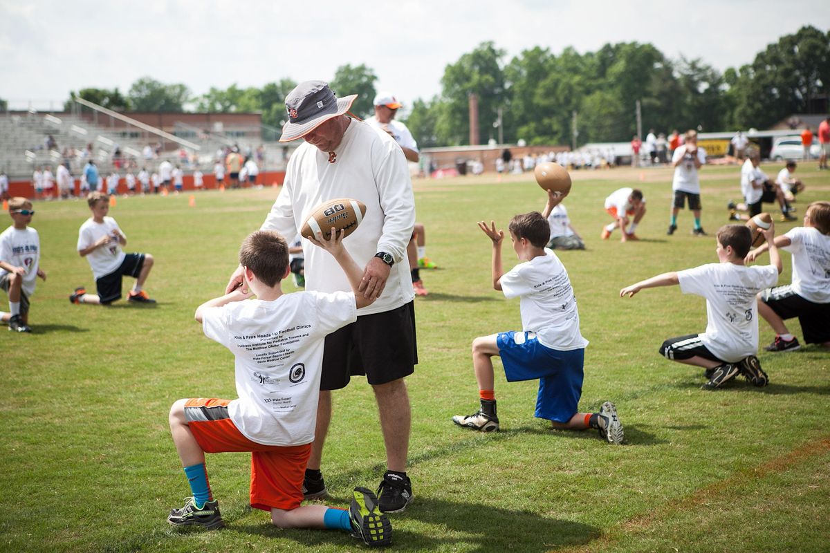 Volunteer Football Clinic - T.V. Foster Youth - Freedom Youth Foundation