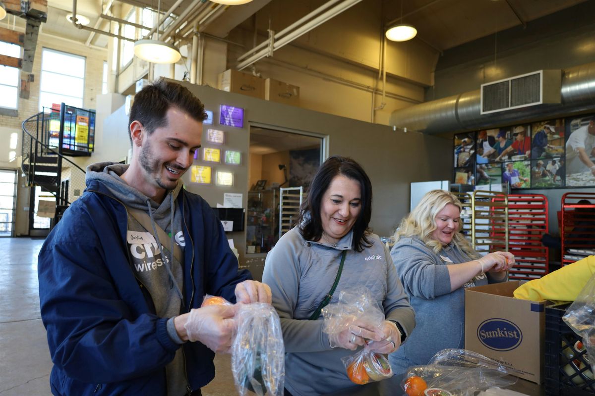 Loading up on Kindness: Volunteers Aid Meal Distribution