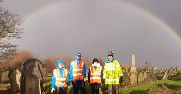 Outdoors activity caring for cemetery.