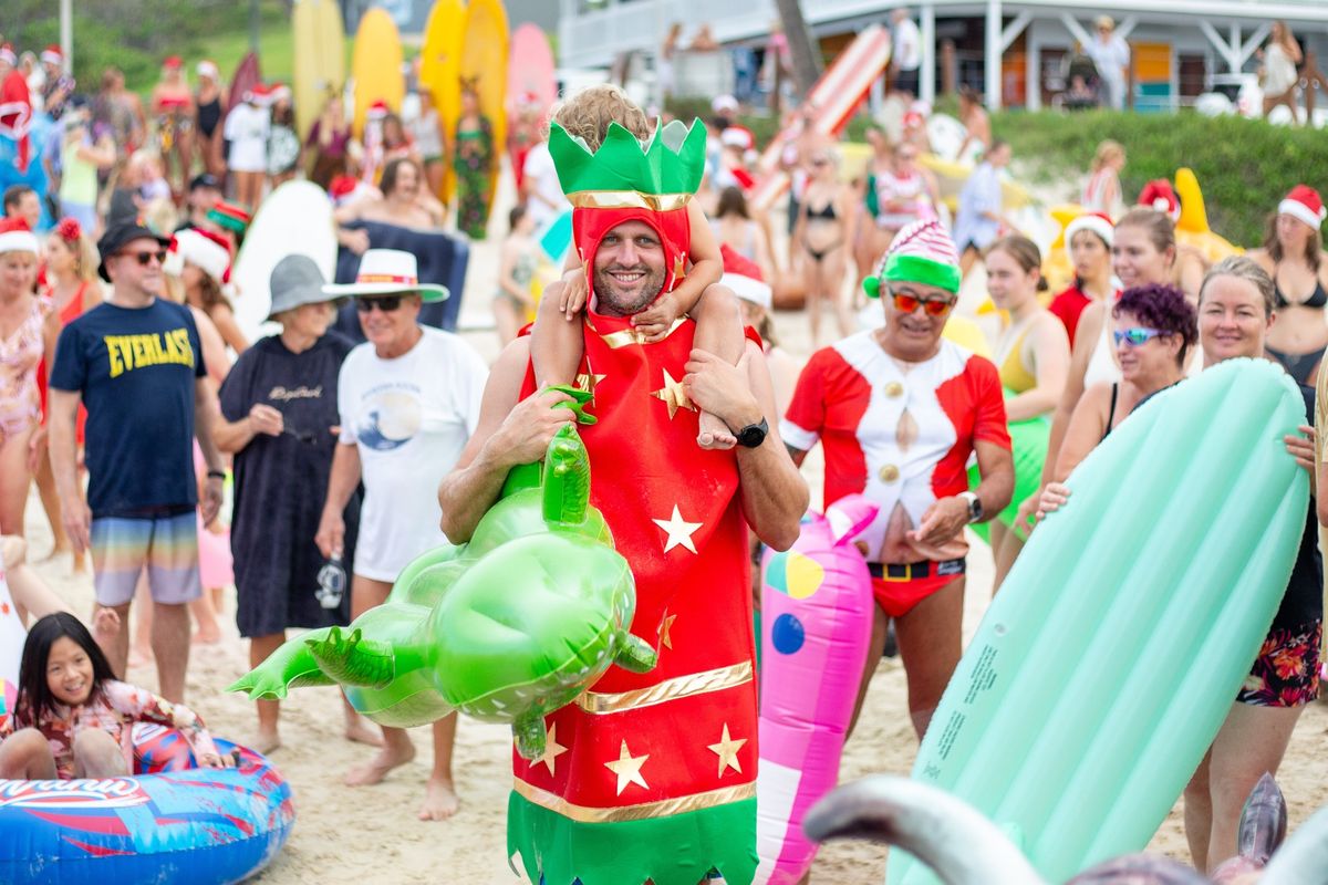 Annual Surfing Santas and Inflatable Toy Beach Party 2024