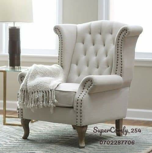 A Majestic, Cream Coloured, Single King Chair