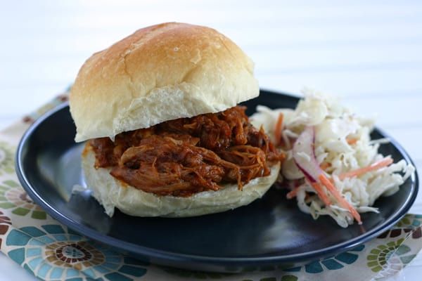 Pulled pork sandwich with cole slaw dinner