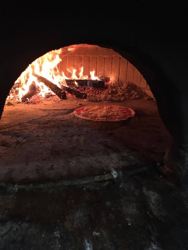 Fire Up Your Passion: Master Pizza Making in Our Authentic Pizza Oven!