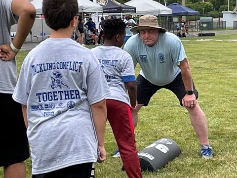 3rd Annual Tacking Conflict Together Football Camp