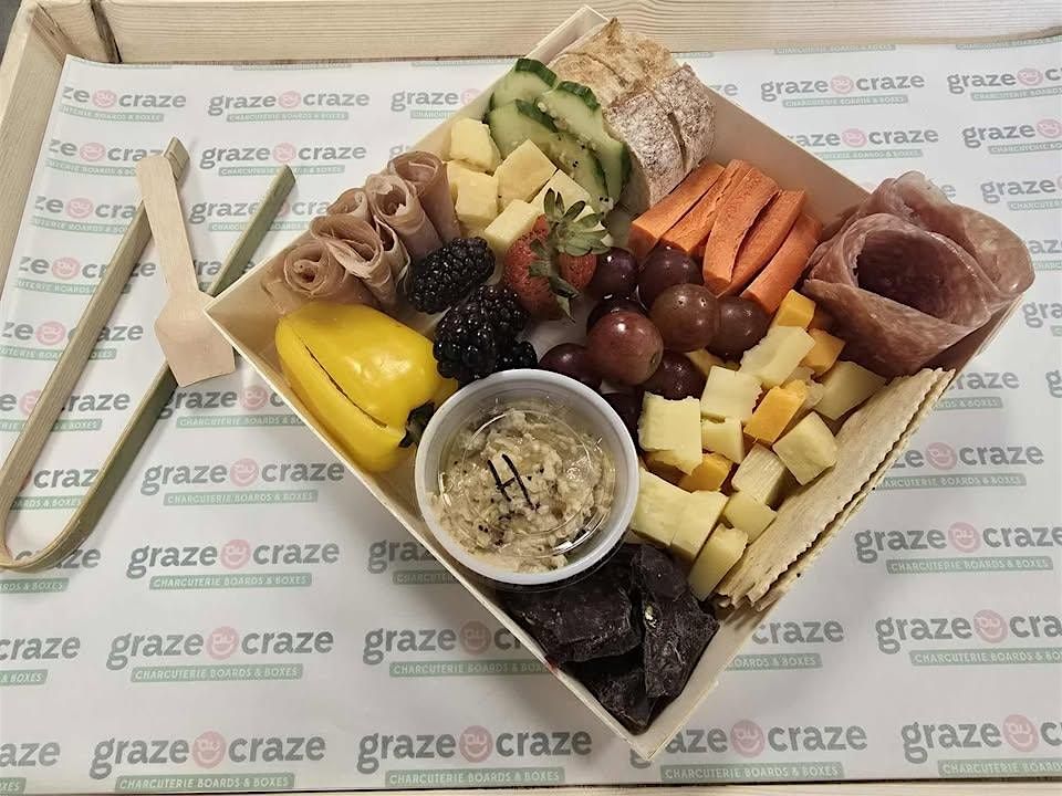 Graze Craze build a charcuterie board along with meat and cheese tasting