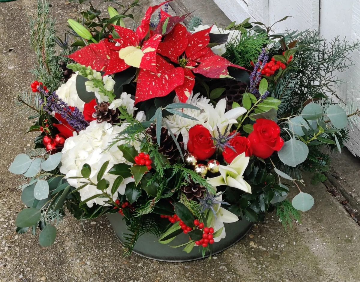 Christmas Centerpiece with fresh flowers and greens