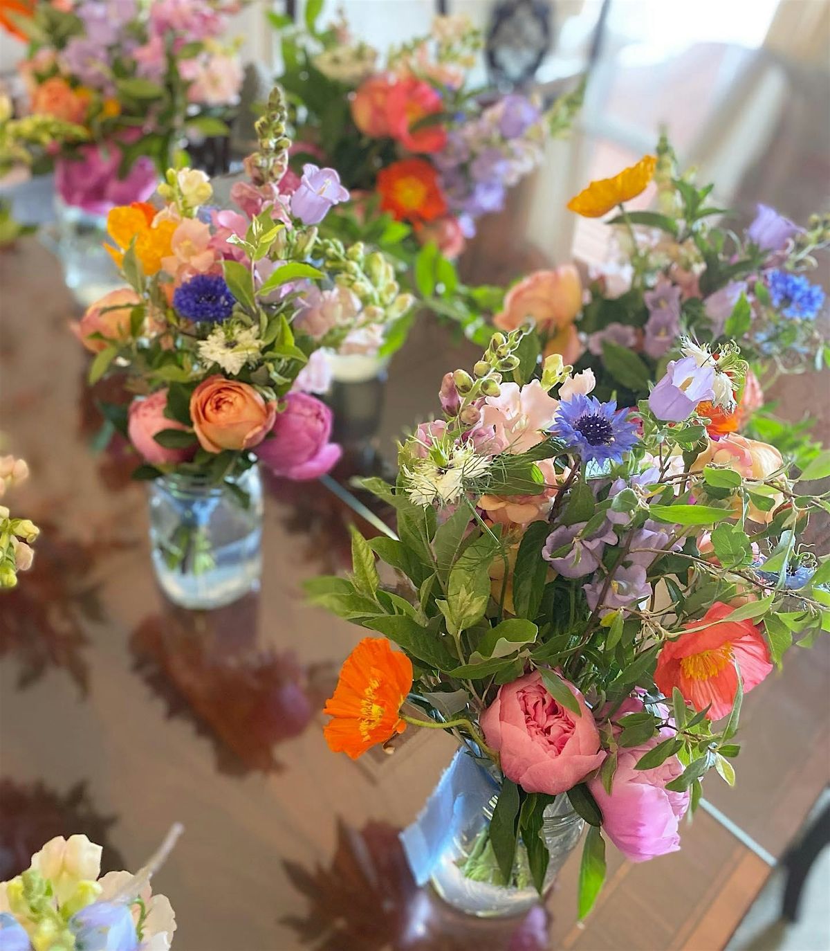 Floral Arrangement with Marigold Sisters