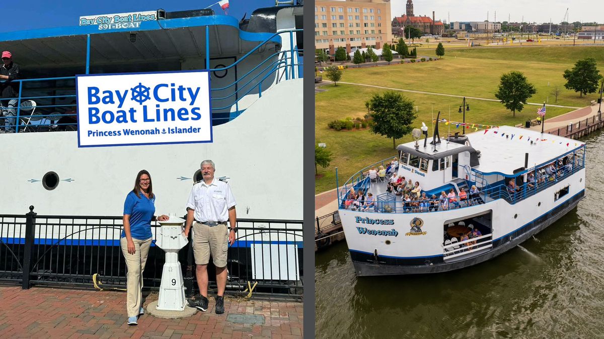 Todd Shorkey and Michelle Judd with "History of the Bay City Boat Lines"