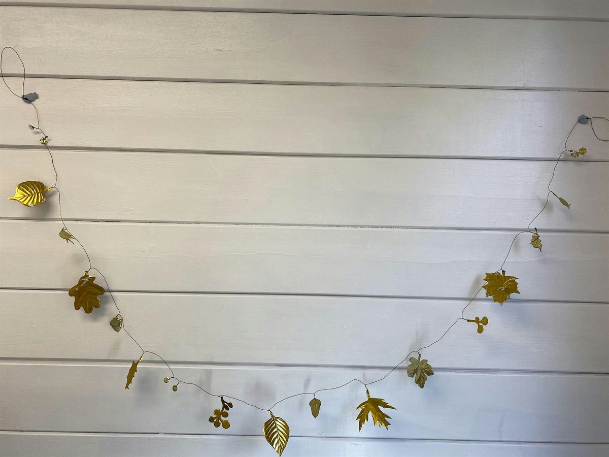 Create a Woodland Garland from recycled tomato paste tubes 2