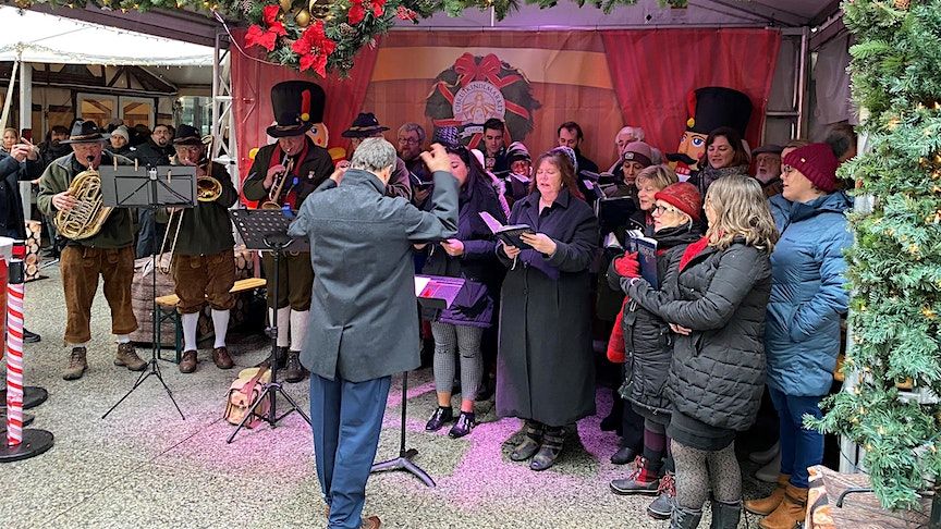 Caroling at Christkindlemarkt