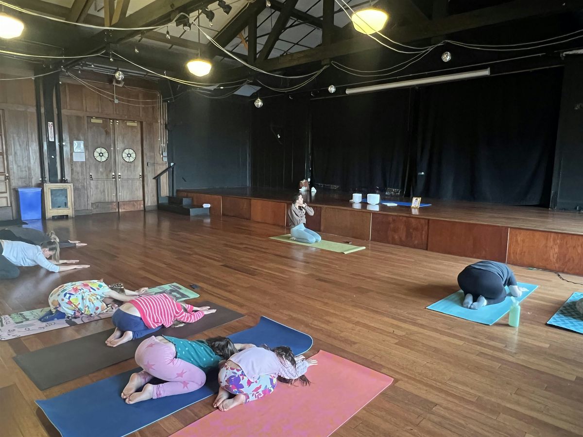 Mom and Young Daughter Yoga and Sound Bath