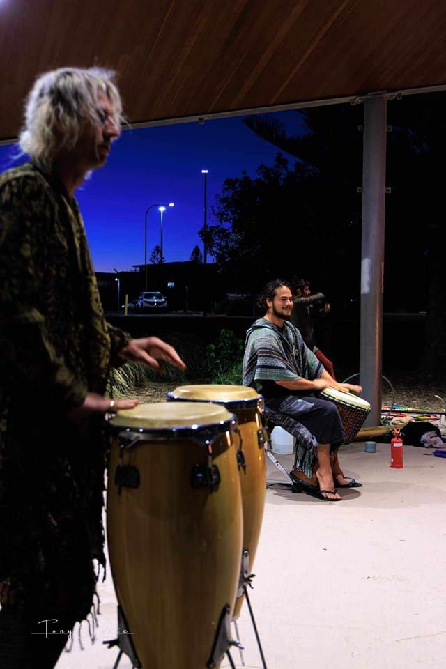 Coffs Drumming circle and Fire twirling 