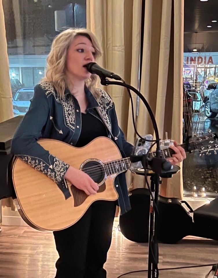 Bella Perrotta performing at The Hill Bar & Grille