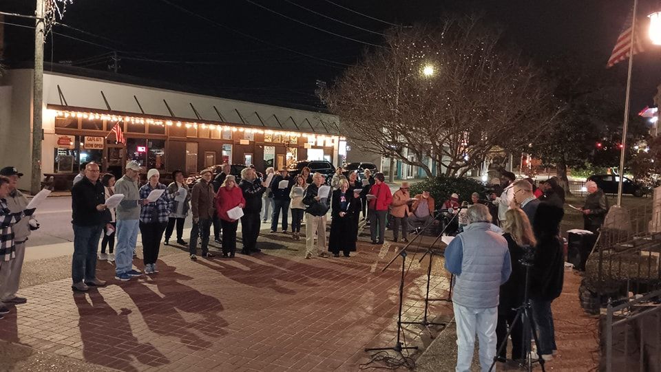 CAROLING IN THE CATHEDRAL SQUARE