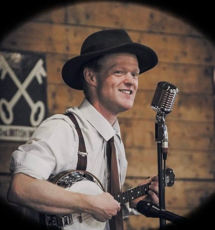 Kyle Evans as George Formby